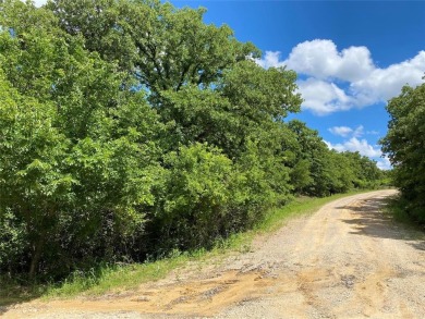 Fantastic 1.5 acre corner lot in the private gated community of on Nocona Hills Golf Course in Texas - for sale on GolfHomes.com, golf home, golf lot