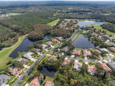 Under contract-accepting backup offers. Welcome to this stunning on Crescent Oaks Country Club in Florida - for sale on GolfHomes.com, golf home, golf lot