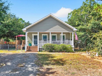Island Charm at Its Best!
This custom-built furnished coastal on Founders Club At St. James Plantation in North Carolina - for sale on GolfHomes.com, golf home, golf lot