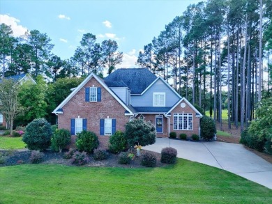 Experience the best of golf and lake living in this 4-bedroom, 2 on The Patriot Golf Club At Grand Harbor in South Carolina - for sale on GolfHomes.com, golf home, golf lot