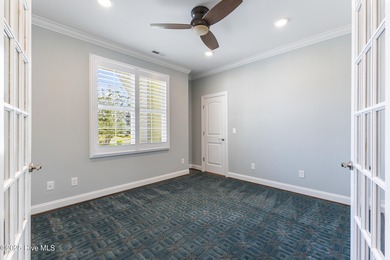 Welcome to this stunning 3-bedroom, 2.5-bathroom home in the on Cape Fear National At Brunswick Forest in North Carolina - for sale on GolfHomes.com, golf home, golf lot