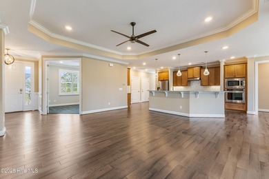 Welcome to this stunning 3-bedroom, 2.5-bathroom home in the on Cape Fear National At Brunswick Forest in North Carolina - for sale on GolfHomes.com, golf home, golf lot