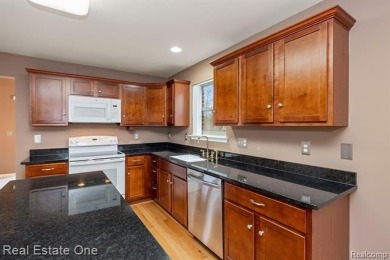 Enjoy an easier lifestyle in this newer detached cape cod condo on Whispering Willows Golf Course in Michigan - for sale on GolfHomes.com, golf home, golf lot