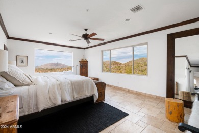 Like two homes in one! Sensational city light and mountain views on Desert Mountain Club - Apache Golf Course in Arizona - for sale on GolfHomes.com, golf home, golf lot