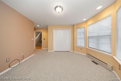 Enjoy an easier lifestyle in this newer detached cape cod condo on Whispering Willows Golf Course in Michigan - for sale on GolfHomes.com, golf home, golf lot