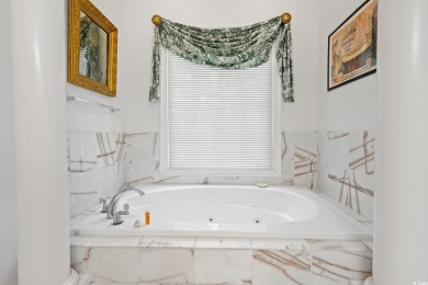 Situated within the quiet and private enclave of Island Green on DeBordieu Country Club in South Carolina - for sale on GolfHomes.com, golf home, golf lot