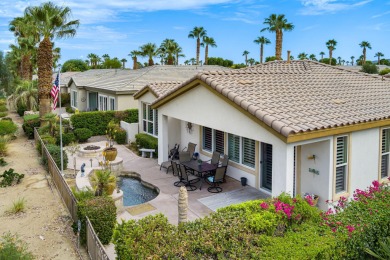 Perched on an elevated 7,841 sq. ft. lot overlooking the 9th on Golf Club At La Quinta in California - for sale on GolfHomes.com, golf home, golf lot