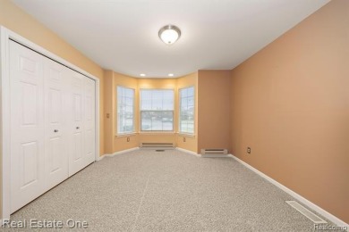 Enjoy an easier lifestyle in this newer detached cape cod condo on Whispering Willows Golf Course in Michigan - for sale on GolfHomes.com, golf home, golf lot