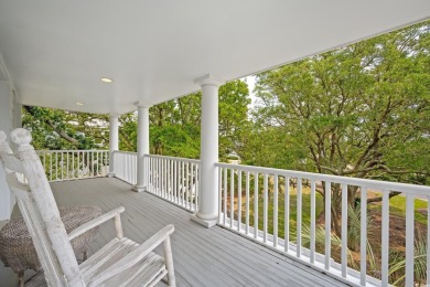 Situated within the quiet and private enclave of Island Green on DeBordieu Country Club in South Carolina - for sale on GolfHomes.com, golf home, golf lot