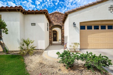 Perched on an elevated 7,841 sq. ft. lot overlooking the 9th on Golf Club At La Quinta in California - for sale on GolfHomes.com, golf home, golf lot