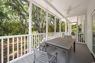 Situated within the quiet and private enclave of Island Green on DeBordieu Country Club in South Carolina - for sale on GolfHomes.com, golf home, golf lot