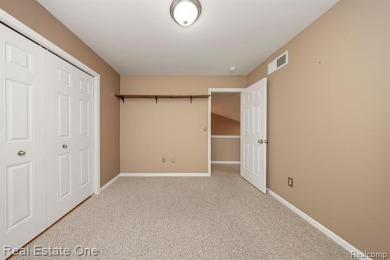 Enjoy an easier lifestyle in this newer detached cape cod condo on Whispering Willows Golf Course in Michigan - for sale on GolfHomes.com, golf home, golf lot