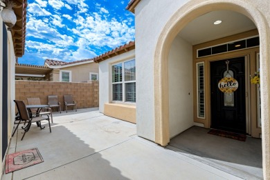 Perched on an elevated 7,841 sq. ft. lot overlooking the 9th on Golf Club At La Quinta in California - for sale on GolfHomes.com, golf home, golf lot