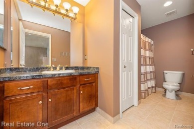 Enjoy an easier lifestyle in this newer detached cape cod condo on Whispering Willows Golf Course in Michigan - for sale on GolfHomes.com, golf home, golf lot