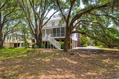 Situated within the quiet and private enclave of Island Green on DeBordieu Country Club in South Carolina - for sale on GolfHomes.com, golf home, golf lot