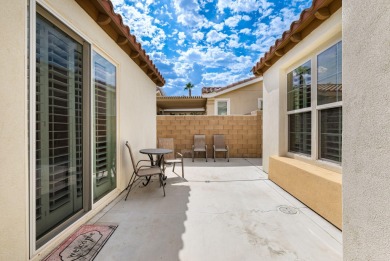 Perched on an elevated 7,841 sq. ft. lot overlooking the 9th on Golf Club At La Quinta in California - for sale on GolfHomes.com, golf home, golf lot