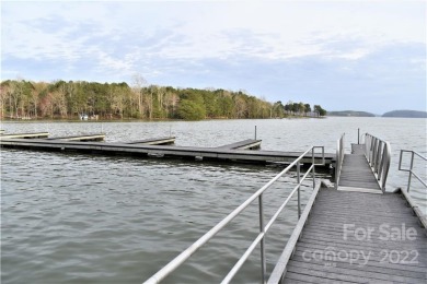 This Badin Lake waterfront lot is located in the prestigious on Old North State Club in North Carolina - for sale on GolfHomes.com, golf home, golf lot