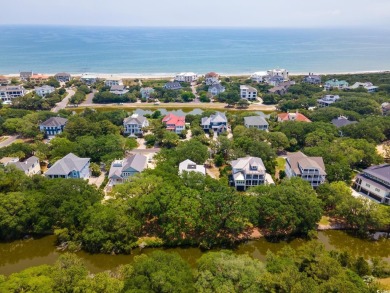 Situated within the quiet and private enclave of Island Green on DeBordieu Country Club in South Carolina - for sale on GolfHomes.com, golf home, golf lot
