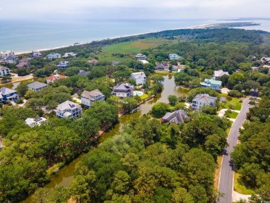 Situated within the quiet and private enclave of Island Green on DeBordieu Country Club in South Carolina - for sale on GolfHomes.com, golf home, golf lot