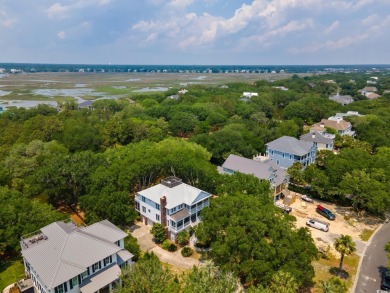 Situated within the quiet and private enclave of Island Green on DeBordieu Country Club in South Carolina - for sale on GolfHomes.com, golf home, golf lot