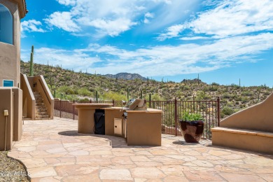 Like two homes in one! Sensational city light and mountain views on Desert Mountain Club - Apache Golf Course in Arizona - for sale on GolfHomes.com, golf home, golf lot