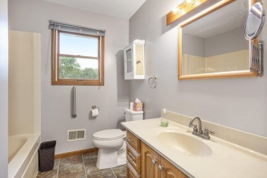 This property is a must see! Three bedroom, 2 bath, walkout on The Links of Bowen Lake in Michigan - for sale on GolfHomes.com, golf home, golf lot