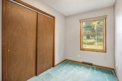 This property is a must see! Three bedroom, 2 bath, walkout on The Links of Bowen Lake in Michigan - for sale on GolfHomes.com, golf home, golf lot