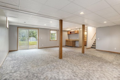 This property is a must see! Three bedroom, 2 bath, walkout on The Links of Bowen Lake in Michigan - for sale on GolfHomes.com, golf home, golf lot