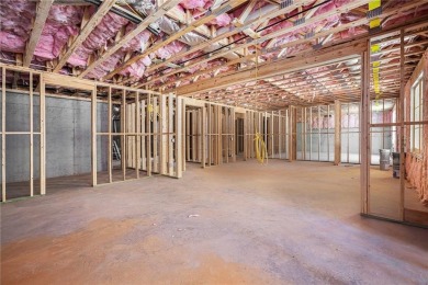 Set on a sprawling 1-acre lot in an established, tree-lined on Dunwoody Country Club in Georgia - for sale on GolfHomes.com, golf home, golf lot