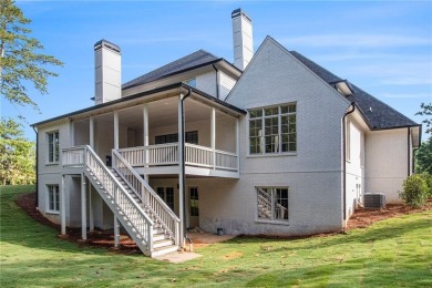 Set on a sprawling 1-acre lot in an established, tree-lined on Dunwoody Country Club in Georgia - for sale on GolfHomes.com, golf home, golf lot