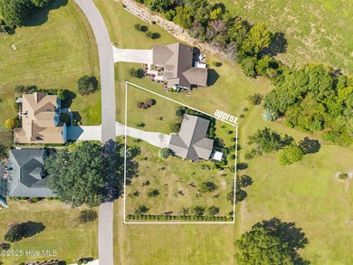 Welcome to this charming coastal 3 bedroom, 2 bath residence in on Lockwood Folly Country Club in North Carolina - for sale on GolfHomes.com, golf home, golf lot