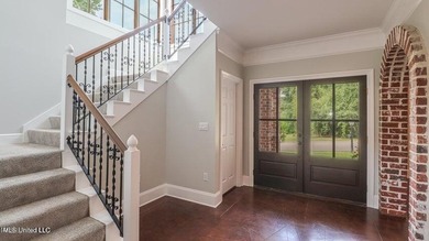 Luxurious custom built home located on the 1st hole in the on The Oaks Golf Club in Mississippi - for sale on GolfHomes.com, golf home, golf lot