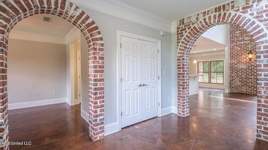 Luxurious custom built home located on the 1st hole in the on The Oaks Golf Club in Mississippi - for sale on GolfHomes.com, golf home, golf lot