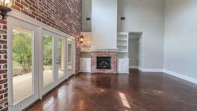 Luxurious custom built home located on the 1st hole in the on The Oaks Golf Club in Mississippi - for sale on GolfHomes.com, golf home, golf lot