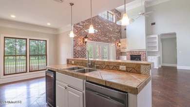 Luxurious custom built home located on the 1st hole in the on The Oaks Golf Club in Mississippi - for sale on GolfHomes.com, golf home, golf lot