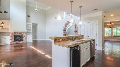 Luxurious custom built home located on the 1st hole in the on The Oaks Golf Club in Mississippi - for sale on GolfHomes.com, golf home, golf lot