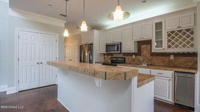 Luxurious custom built home located on the 1st hole in the on The Oaks Golf Club in Mississippi - for sale on GolfHomes.com, golf home, golf lot