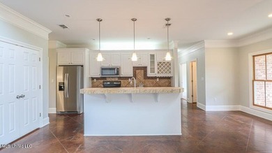 Luxurious custom built home located on the 1st hole in the on The Oaks Golf Club in Mississippi - for sale on GolfHomes.com, golf home, golf lot