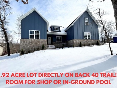 Stunning new construction home on a massive .92 acre double on Bella Vista - Metfield Golf Complex and Country Club in Arkansas - for sale on GolfHomes.com, golf home, golf lot