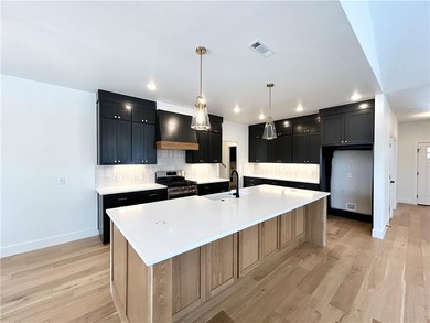 Stunning new construction home on a massive .92 acre double on Bella Vista - Metfield Golf Complex and Country Club in Arkansas - for sale on GolfHomes.com, golf home, golf lot