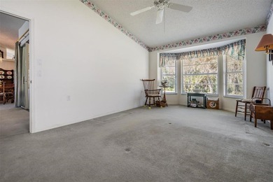 SPACIOUS 3 BEDROOM, 2 BATHROOM HOME ON CONSERVATION LOT IN MAIN on Timber Greens Country Club in Florida - for sale on GolfHomes.com, golf home, golf lot