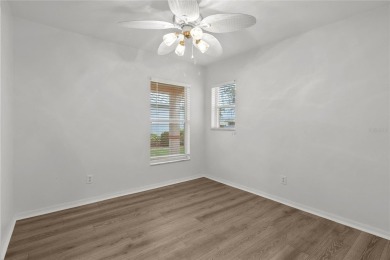 Brand new laminate flooring.  Afforded protection with a new on Kingsway Country Club in Florida - for sale on GolfHomes.com, golf home, golf lot