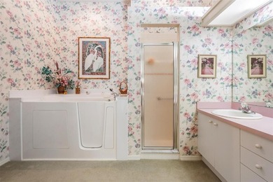 SPACIOUS 3 BEDROOM, 2 BATHROOM HOME ON CONSERVATION LOT IN MAIN on Timber Greens Country Club in Florida - for sale on GolfHomes.com, golf home, golf lot