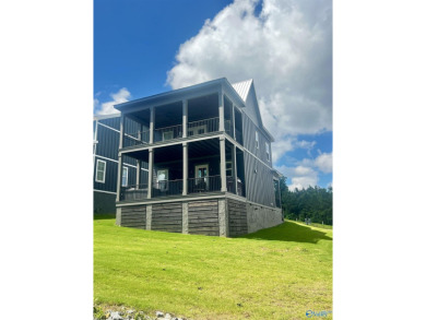 This beautiful home is located in The Grande and sits along the on Gunters Landing in Alabama - for sale on GolfHomes.com, golf home, golf lot