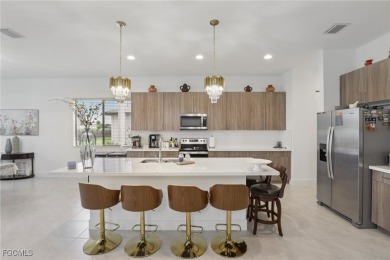 Discover luxury living with scenic golf course views and no rear on Panther Run Golf Club in Florida - for sale on GolfHomes.com, golf home, golf lot