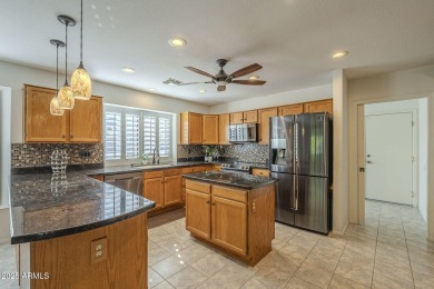 Nestled in Westbrook Village, a 55+ resort-style active on Westbrook Village Golf Club in Arizona - for sale on GolfHomes.com, golf home, golf lot