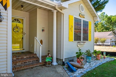 Welcome to this stunning single-level waterfront rancher in on Ocean Pines Golf and Country Club in Maryland - for sale on GolfHomes.com, golf home, golf lot