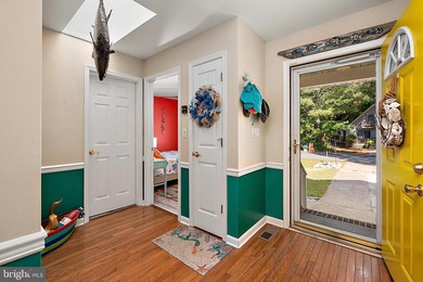 Welcome to this stunning single-level waterfront rancher in on Ocean Pines Golf and Country Club in Maryland - for sale on GolfHomes.com, golf home, golf lot