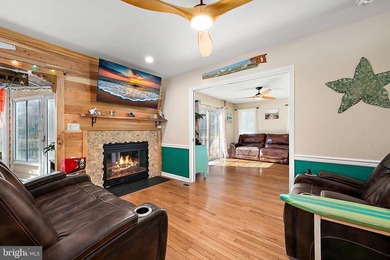 Welcome to this stunning single-level waterfront rancher in on Ocean Pines Golf and Country Club in Maryland - for sale on GolfHomes.com, golf home, golf lot