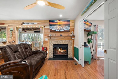 Welcome to this stunning single-level waterfront rancher in on Ocean Pines Golf and Country Club in Maryland - for sale on GolfHomes.com, golf home, golf lot